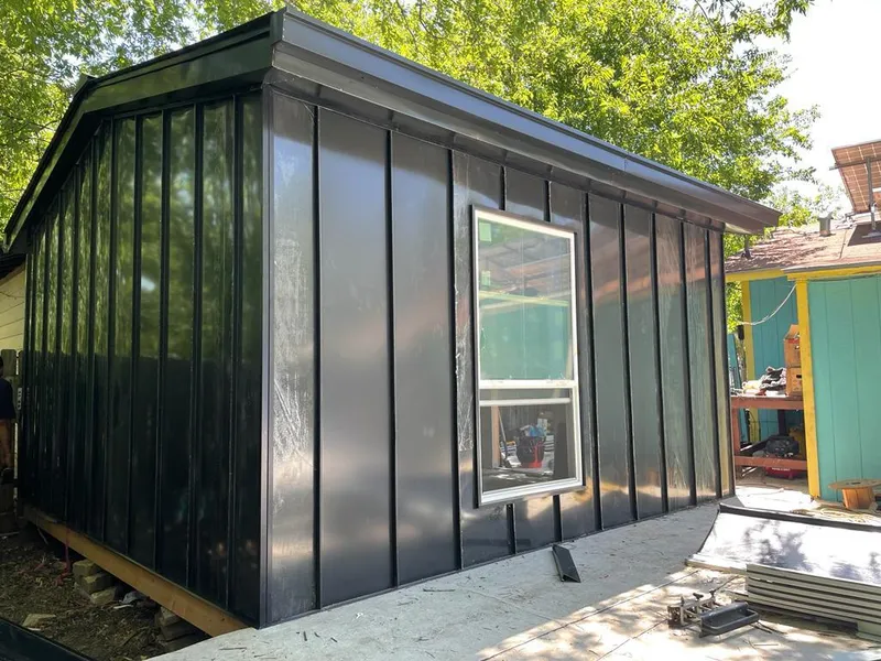 Black standing seam metal wall panels for Roof Inspection in Waterville