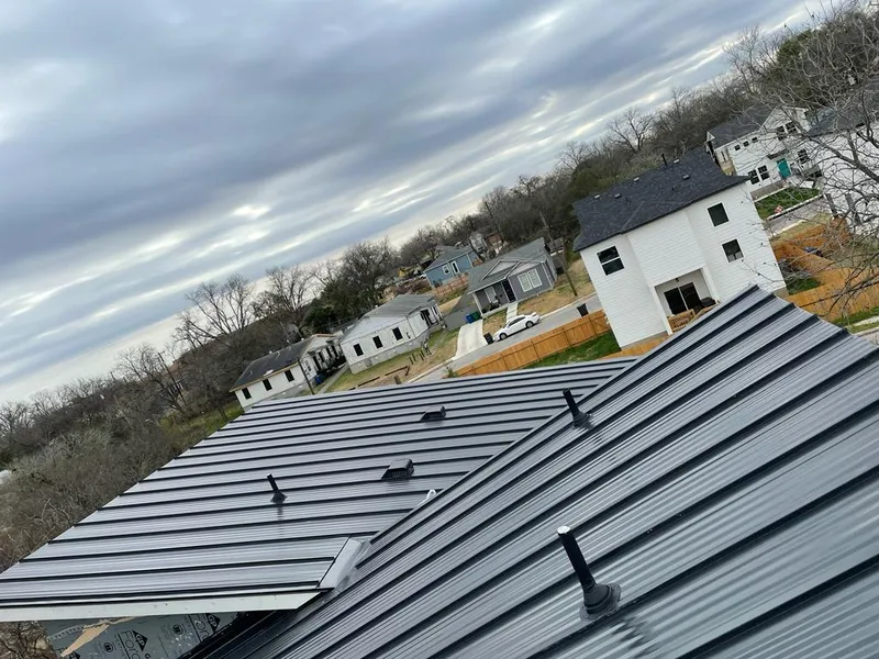 Standing seam metal roof panels with vents for Skylight Repair in Waterville